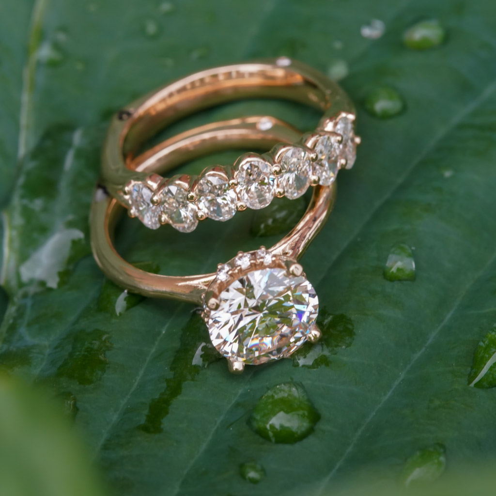 Hidden Halo Wedding Set with Oval Diamonds in Band