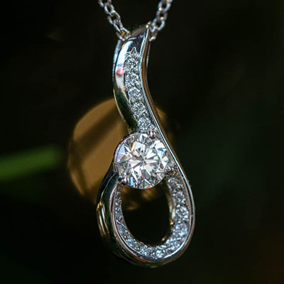 Custom Diamond Swirl Pendant in Platinum