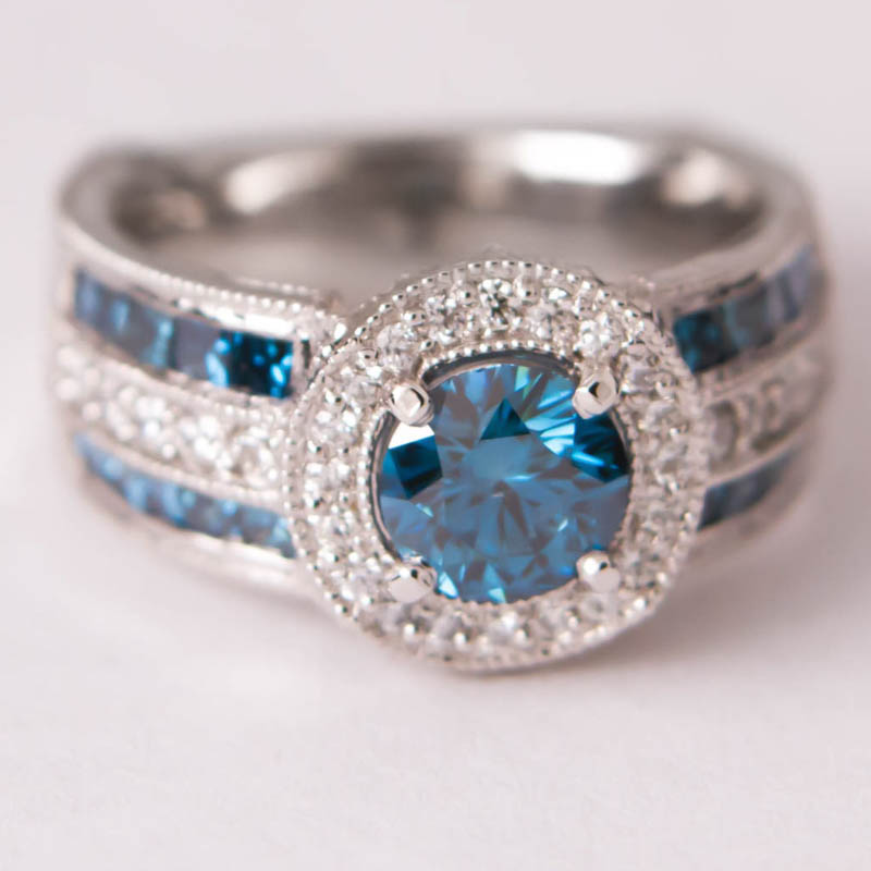 White Gold Ring Containing Blue and White Diamonds